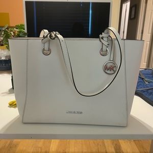 white Micheal Kors purse. lightly used
